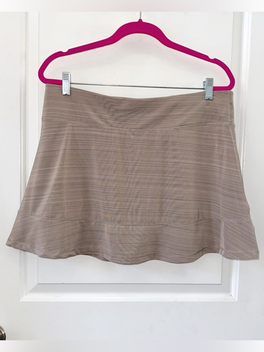 Calvin Klein Performance Athletic Skort in a heathered light taupe/tan shade